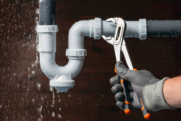 Professional Drain Cleaning technician working in Urbana, IN